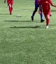 Soccer Player Takes Off Her Shoe to Land Kick