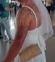 Man Walks Through Airport In Wedding Dress