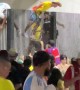 Soccer Fans Climb Over Fence at Stadium