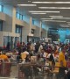 Travelers Delayed By Global Outages At Singapore Airport