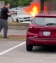 People Pull Passengers Out of Burning Car