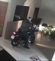 Chair Gets Caught on Motorcycle