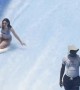 Surf Pool Attendant Is Prepared For Woman's Wipeout