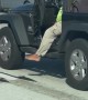 Driver Lets His Foot Hang Loose on the Highway