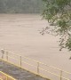 Pontoon Boat Goes Over Flooded Dam in Virginia