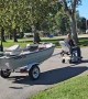 Man Pulls Boat With a Motorized Chair
