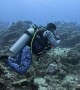 Bored Scuba Diver Plays With Plastic Bottle