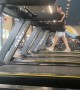 Woman Slips On Treadmill While Gym Ignores Her