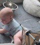 Son Slides Smoothly Over Camp Chair