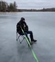 Four Wheeler Pulls Lawn Chair Across Ice