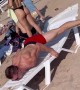 Man Demonstrates Muscled Balance On Beach Chair