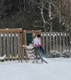 Little Girl Takes A Tumble Sliding Into Snow