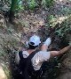 Man Feeling Goofy Jumps Into Muddy Hole