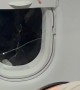 Airplane Passenger Restrained After Allegedly Punching Window