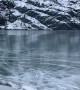 Glacier Breaks Onto Frozen Lake