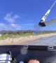 Kiteboarder Flies Beneath Windsurfer