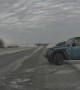 Jeep Loses Control on Slippery Road