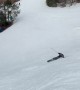 Skiing Father Still Sliding Down Slope