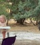 Sneaky Emu Takes Snack From Son