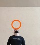 Man Juggles 7 Rings While Balancing One on His Head