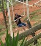 Man Gets Launched Off a Swing
