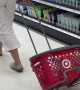 Shopper Drags Basket Around