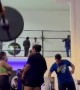 Weightlifter Drops Barbell on Her Back