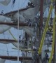 Sailors Dangle From Ship Mast During Bridge Crash