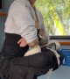 Girl Hanging on Her Hair on a Bus