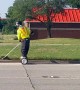 Landscaper Whacks Weeds on a Segway