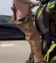 Stunt Rider Crashes Bike on Highway