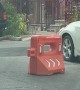 Traffic Barrier Politely Waits For Cars to Pass Before Crossing the Street