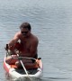 Dicaprio Lookalike Rides Paddle Board