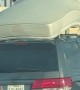 Car Doesn't Pull Over With a Mattress Barely Hanging On