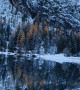 Snowy Mountains Reflected in Crystal-Clear Alpine Lake