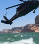 Blackhawk Helicopter Creates New Waves For Wake Surfer