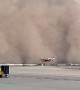 Massive Dust Storm Rolls in as Plane Takes Off