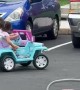 Girls Expertly Drift Toy Car In Parking Lot