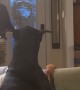Grandma Gently Directs Doberman Off Couch