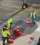 Airport Workers Play With Traffic Cones