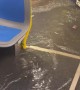 NYC Bus Drives Through Flooded Street