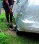 Shrink Wrapping Car To Protect From Hurricane Mellissa