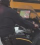 Cop Watching Baseball Game on Motorcycle