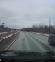 Car Driving on the Wrong Side of the Highway