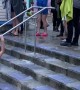 Girl Slips Down Stairs Walking Into Pool
