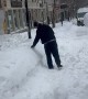 Large Snow Ball Knocks Guy Over