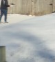 Neighbor Struggles To Walk Pizza Up Icy Driveway