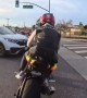 Inattentive Motorcyclist Nearly Hit By Turning SUV