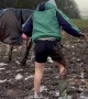 Mucky Boots Cause Muddy Fall While Catching Horse