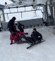 Friends All Fall Exiting The Ski Lift